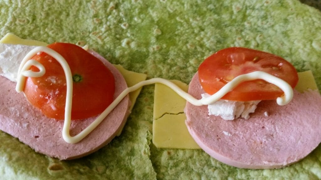 Wrap with tomato vegetarian ham cheese and fetta