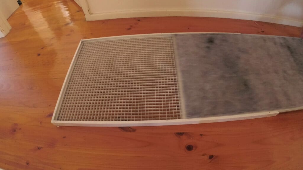 HOW TO REPLACE THE DUCTED AIR CONDITIONER FILTER filter frame into panel